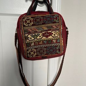 Red and Green Crossbody Bag with Intricate Design